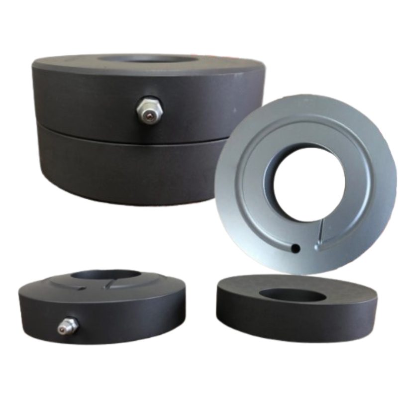 Greaseable steel leveling plates for oilfield equipment
