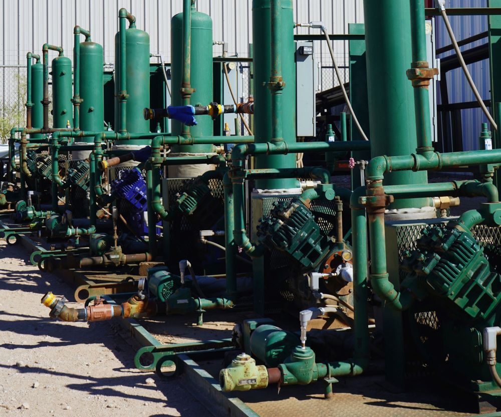 Wellhead compressor package on a field skid